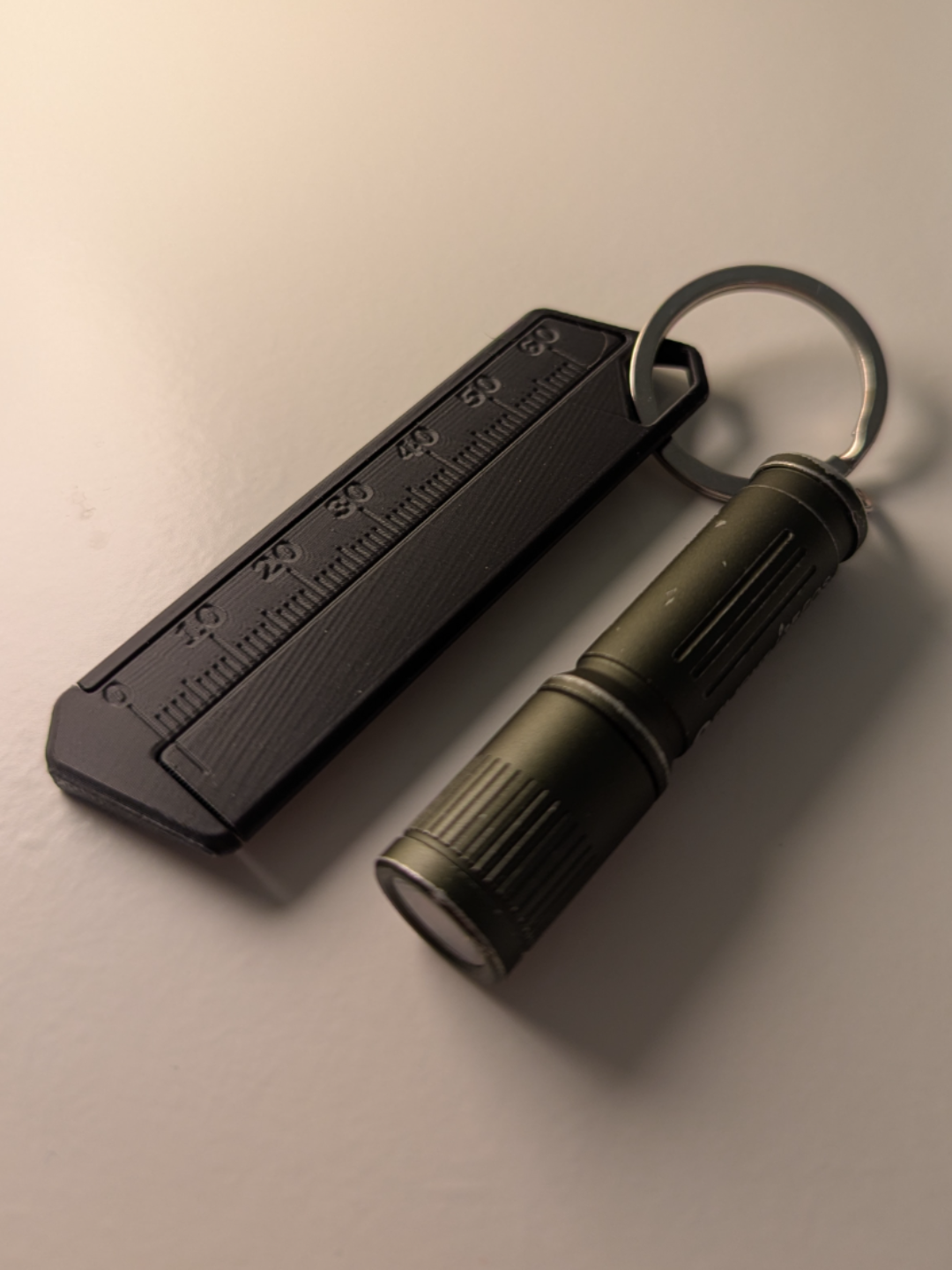 Keyring caliper