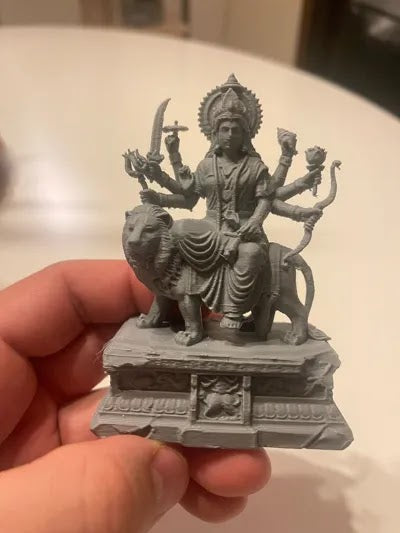 GODDESS DURGA ON LION STATUE