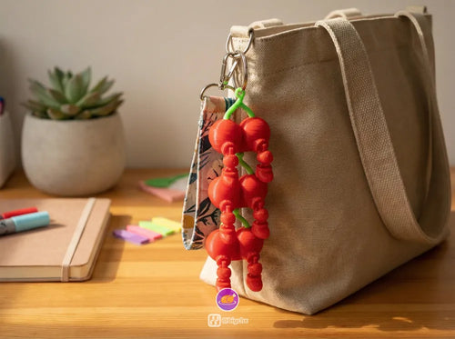 Articulated Fruit Keychains angle – 3D Printed Flexi Fruit Shaped Keychain Set by FOFUS Kerala