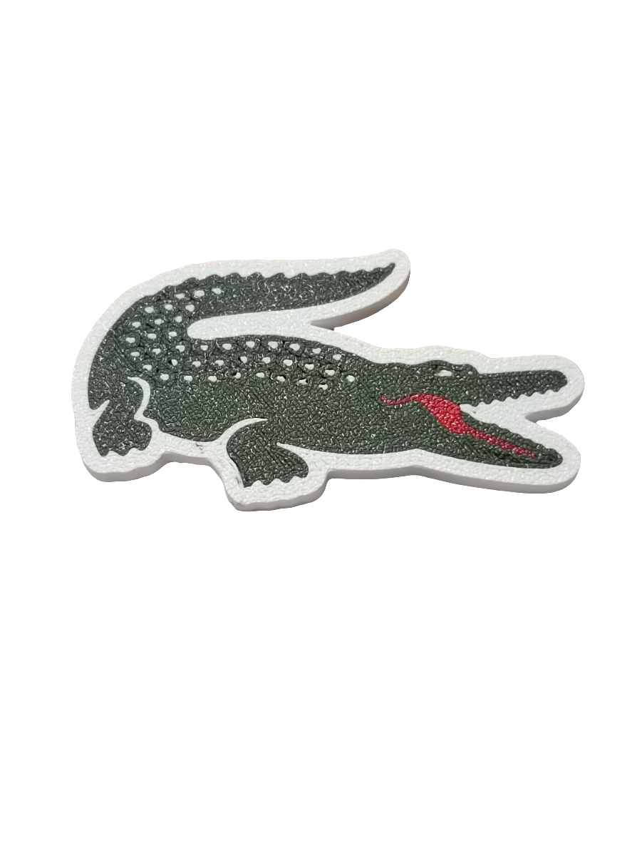 Lacoste brooches