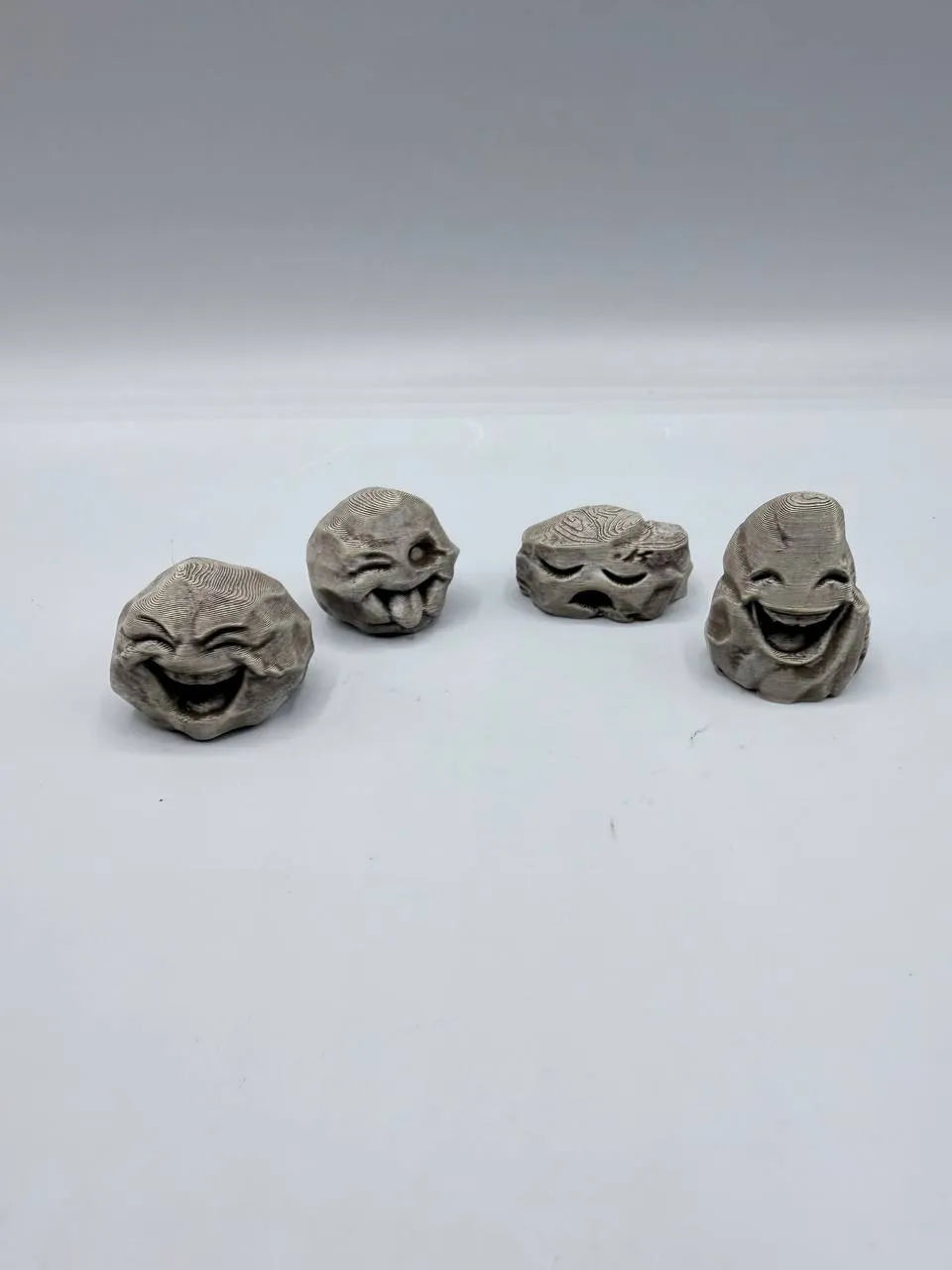Happy Stones angle – 3D Printed Decorative Smiley Pebbles by FOFUS Kerala